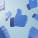 Ikony kciuka w górę symbolizujące polubienia, aprobatę i społeczną akceptację w mediach społecznościowych